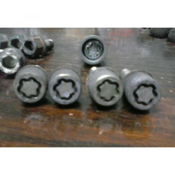 99 VwCabrio aluminun wheel lug nuts with lock lugs and tool #2 image